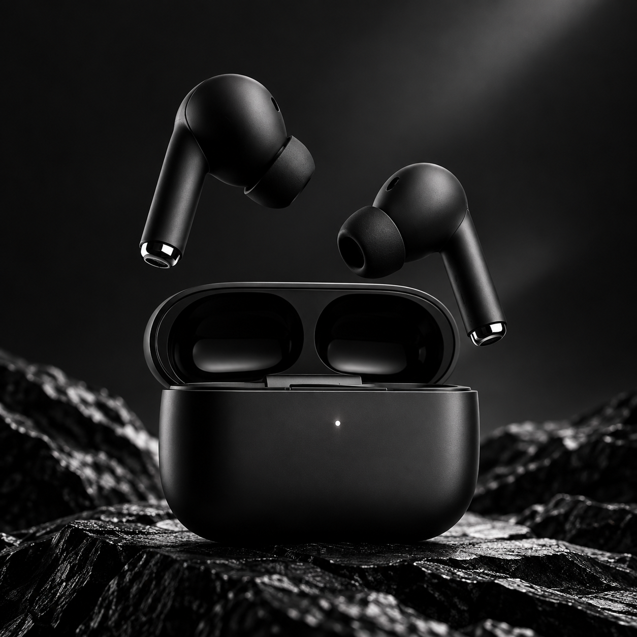 Black wireless earbuds floating above their charging case